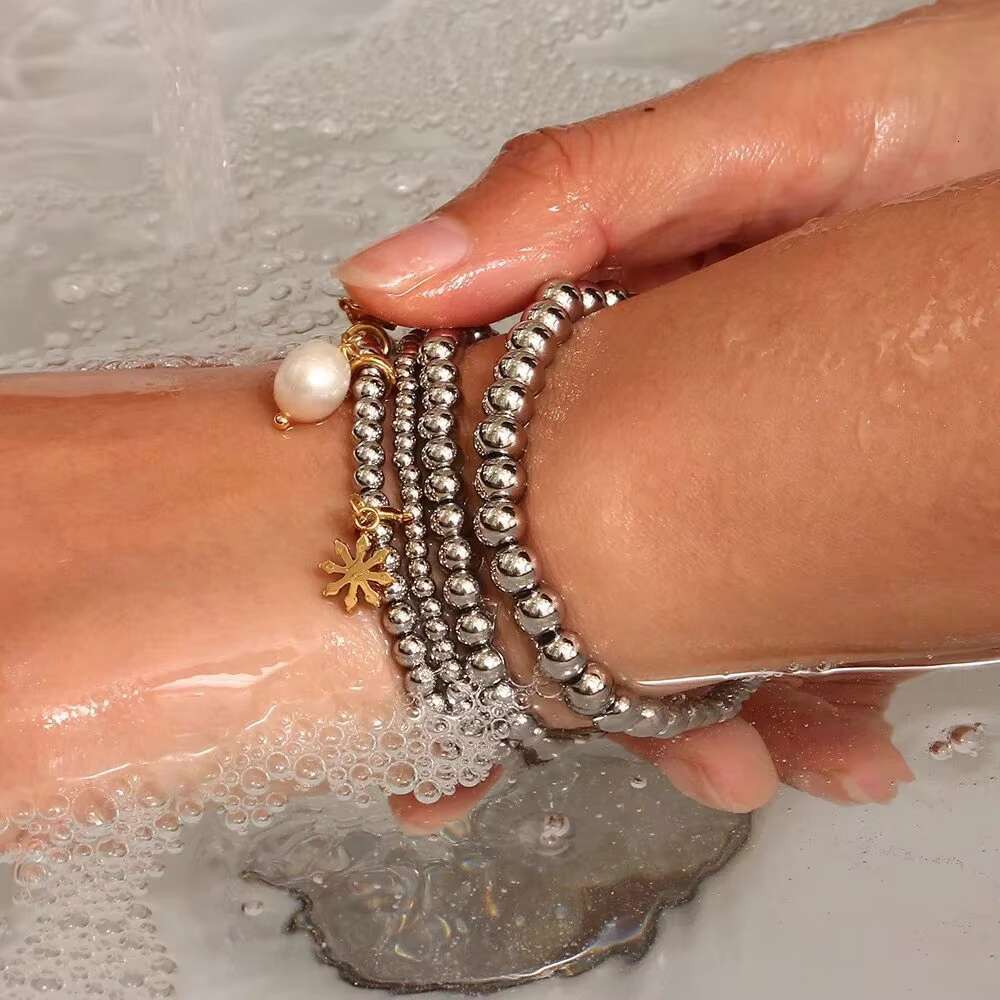 DHcollections Fashionable Women's Multifunctional Gold-plated Matte Waterproof Elastic Adjustable Stainless Steel Men's Bead Bracelet