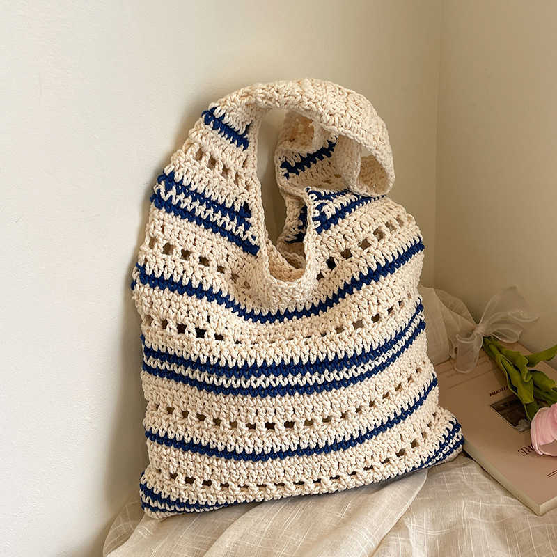 Trendy new hollow woven small fresh artistic style tote bag, niche and lazy, sweet and casual single shoulder women's bag