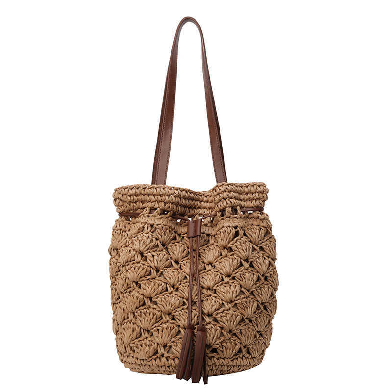 Spring and summer popular casual fashion vacation style beach bag niche design small fresh one shoulder grass woven bag for women