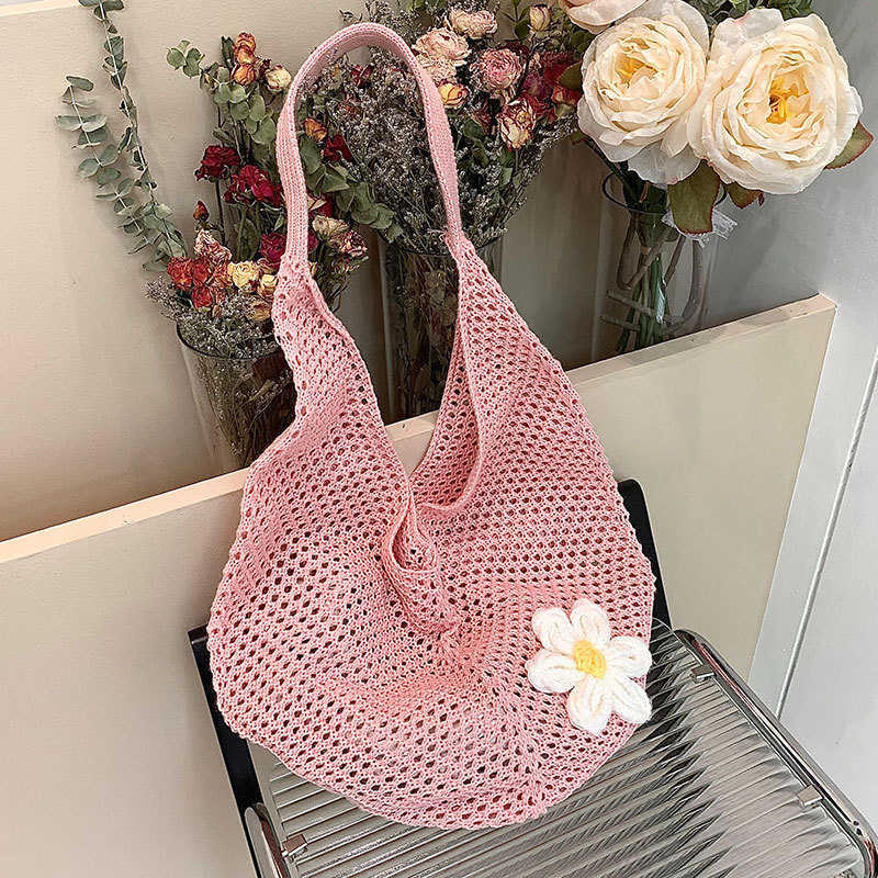 This year's popular trend is the versatile lazy style, small and fresh Instagram woven bag, large capacity hollow out lightweight travel shoulder