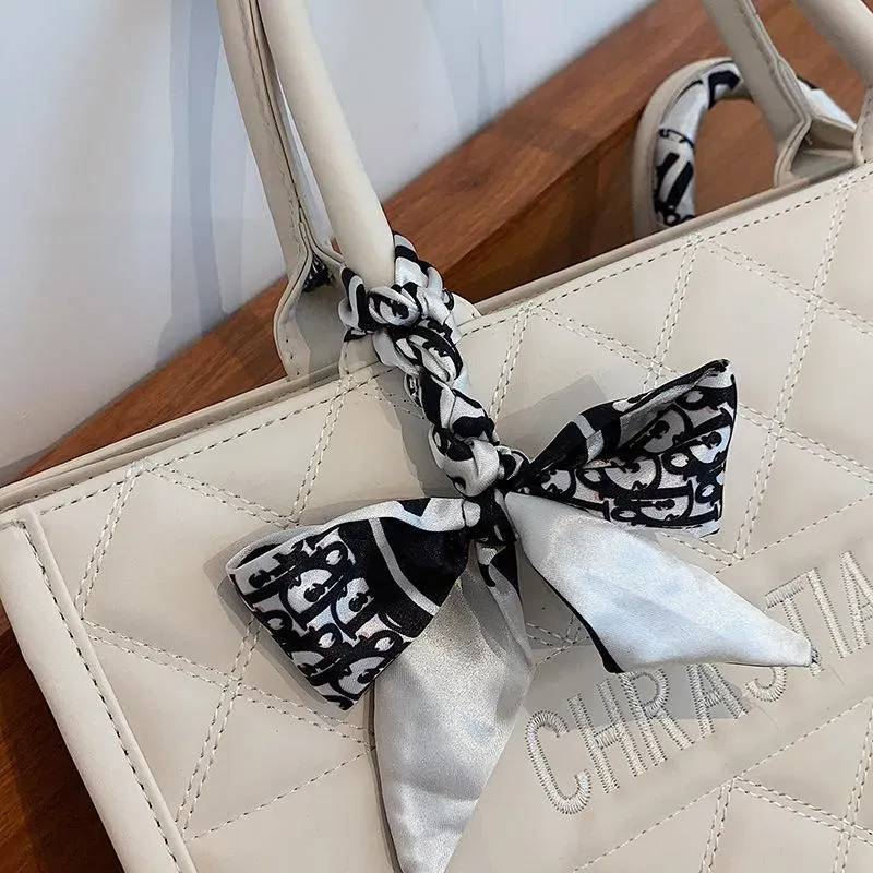 2025 new free shipping designer shoulder bag Vintage Plain casual versatile Tote package for woman black