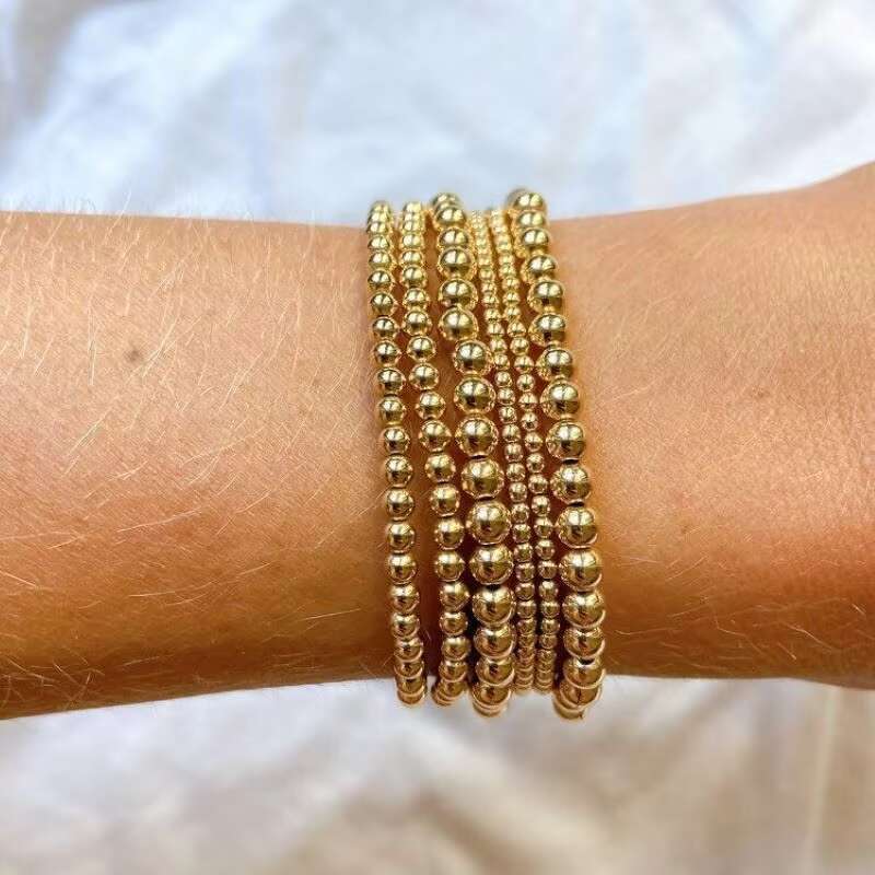 DHcollections Fashionable Women's Multifunctional Gold-plated Matte Waterproof Elastic Adjustable Stainless Steel Men's Bead Bracelet