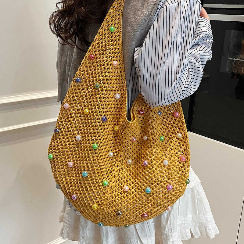 New Relaxation Large Capacity Colored Pearl Knitted Bag with Small Resort Style Hollow Beach Single Shoulder Women's Bag
