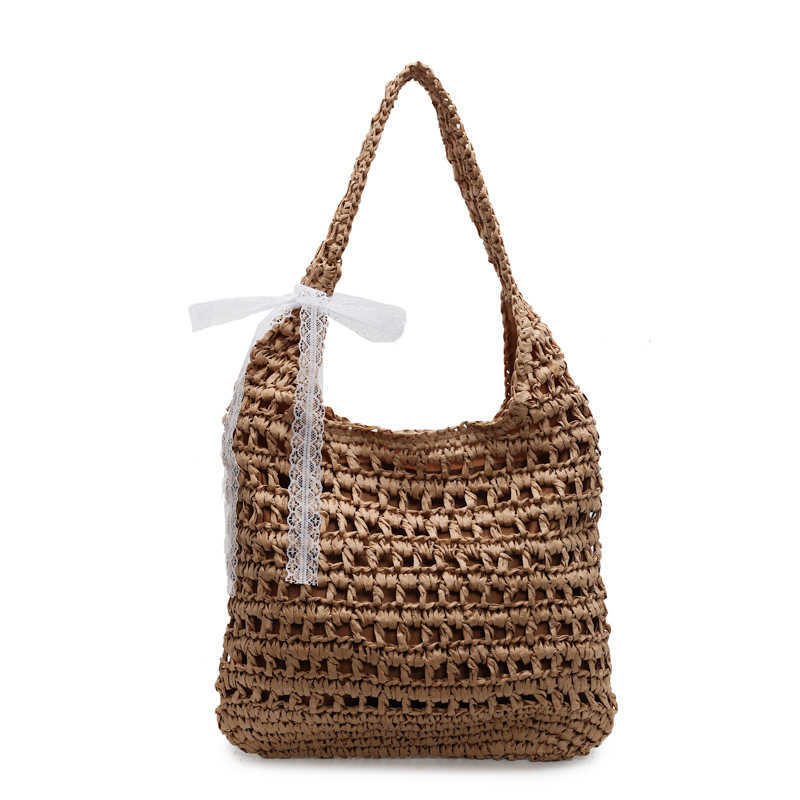 Spring and summer new lazy style artistic hollow woven tote bag casual versatile large capacity vacation style shoulder bag