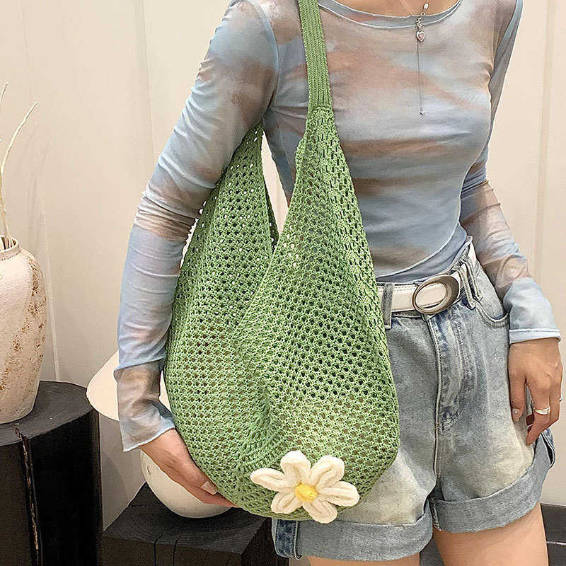 This year's popular trend is the versatile lazy style, small and fresh Instagram woven bag, large capacity hollow out lightweight travel shoulder