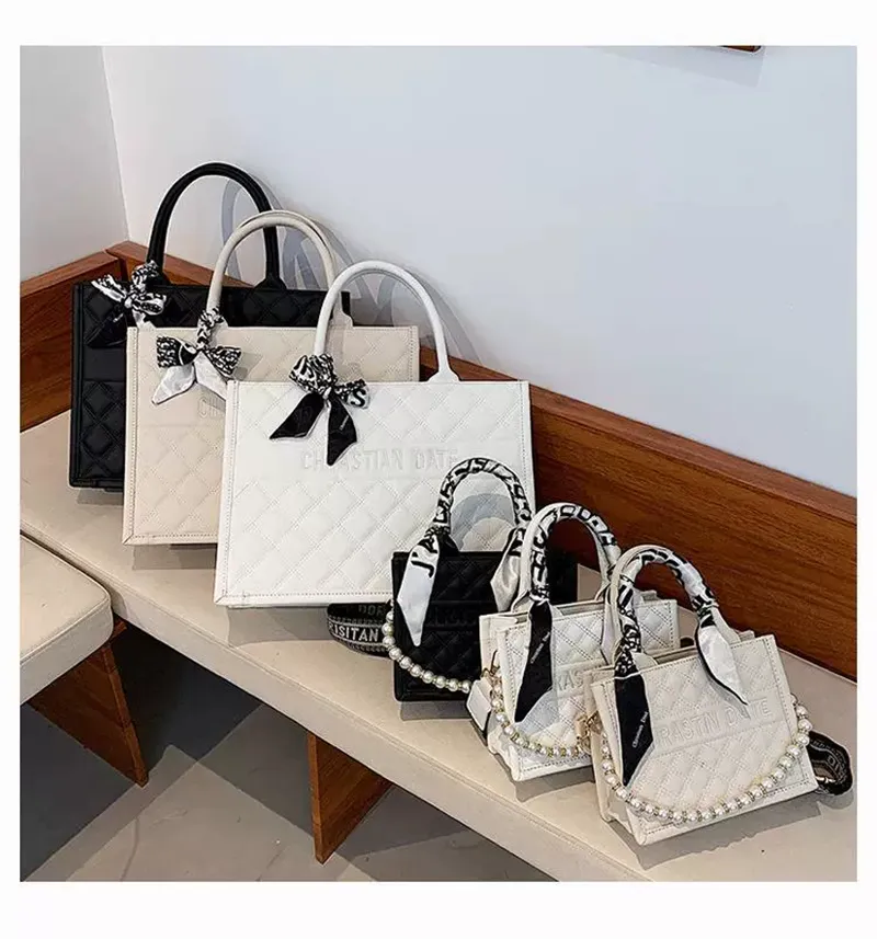 2025 new free shipping designer shoulder bag Vintage Plain casual versatile Tote package for woman black