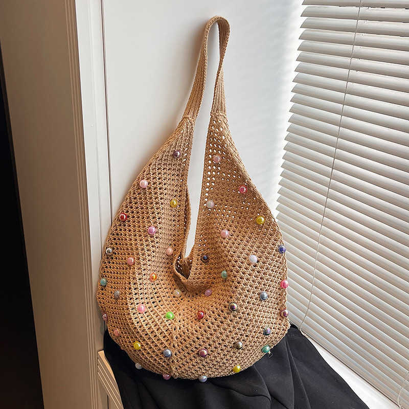 New Relaxation Large Capacity Colored Pearl Knitted Bag with Small Resort Style Hollow Beach Single Shoulder Women's Bag