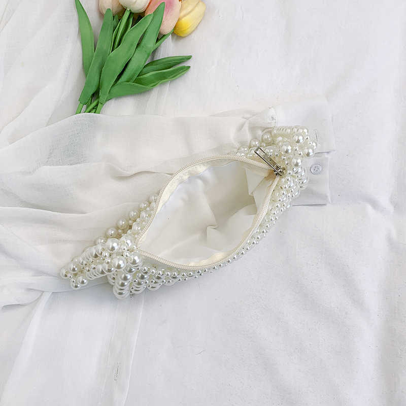 Small niche design, fashionable, simple and versatile women's shoulder bag, 2025 new cute and elegant casual handbag, white