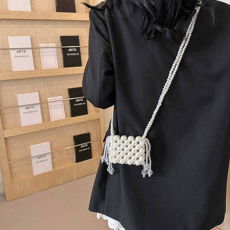 Summer hollow bead bag for women 2025 new fashionable and versatile mini mouth red envelope accessory bag, parent-child crossbody bag