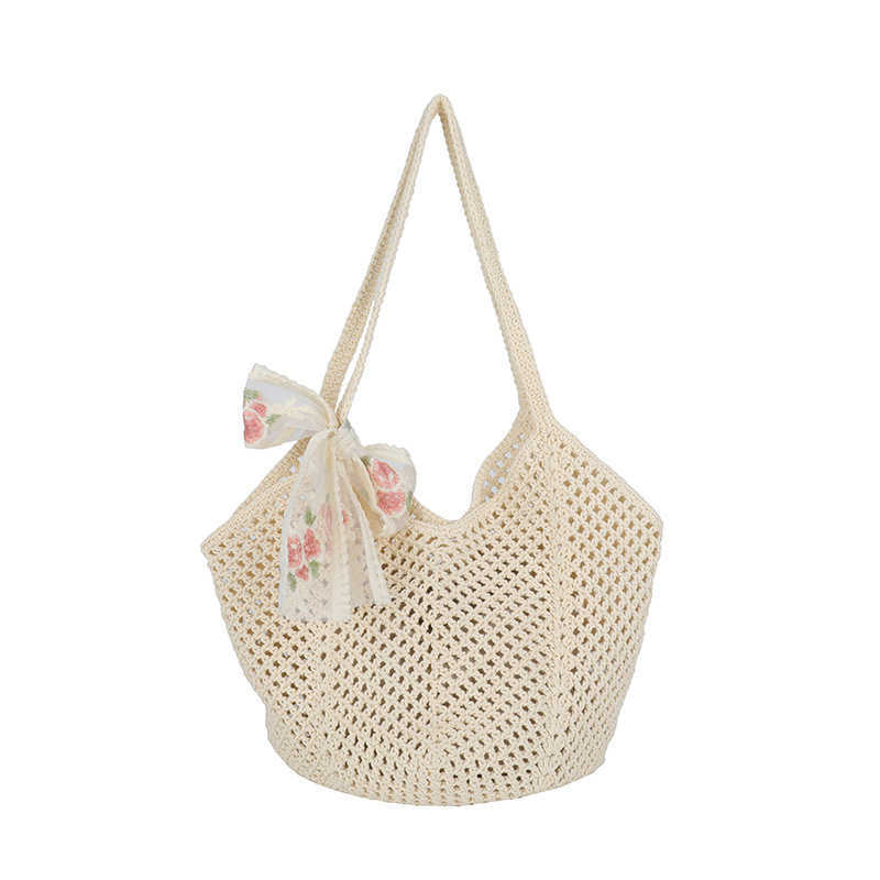 This year's spring and summer artistic style, small and fresh hollow woven tote bag, casual vacation style, large capacity shoulder bag