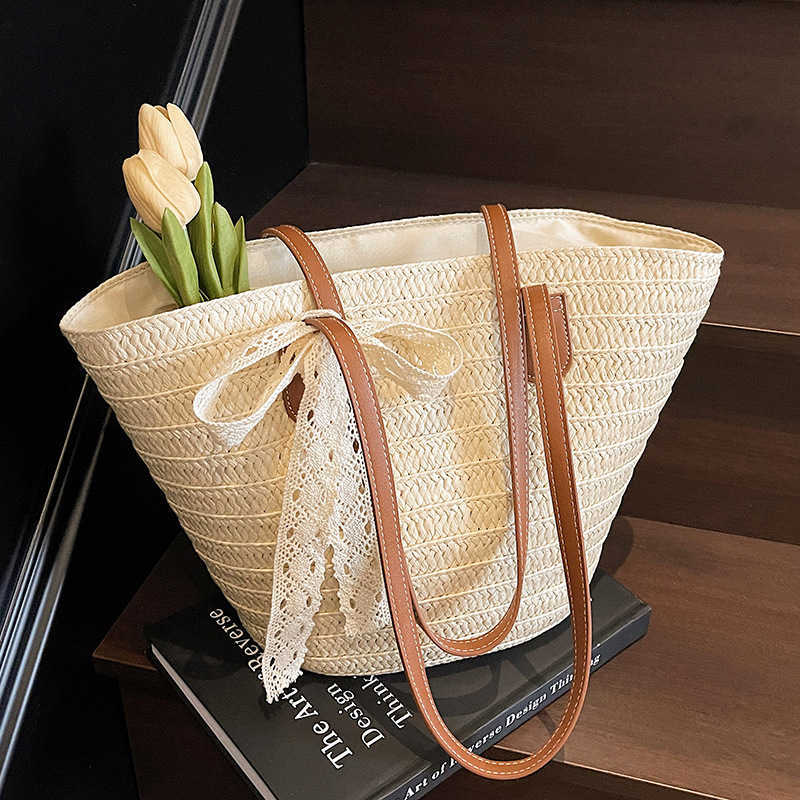 French style artistic beach grass woven shoulder bag for women with a sense of luxury, large capacity for versatile commuting, vegetable basket tote b