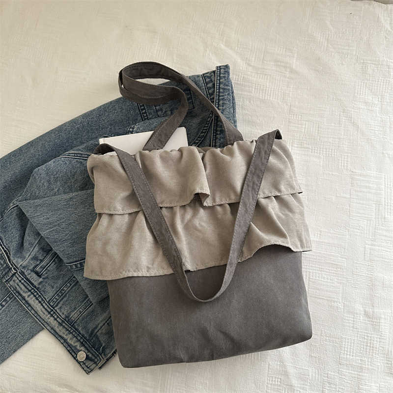 Fashionable and trendy pleated ruffled edge commuting minimalist tote bag with niche design, underarm bag with stylish and large capacity, single shou