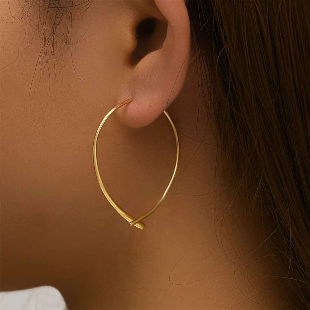 DHCollections Minimalist Loop Drop Earrings for Women Lightweight Curved Bar Style Gold Tone Fashion Jewelry for Daily Wear and Gifts