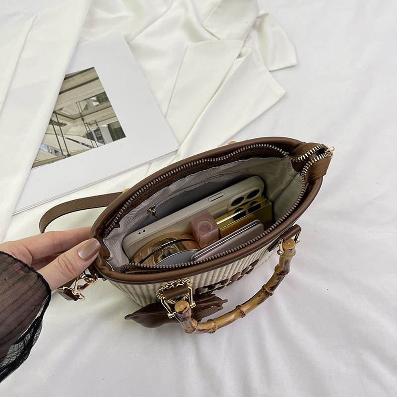 Womens bag 2025 new fashion trend bucket bag grass woven bamboo knot tote bag beach shoulder bag