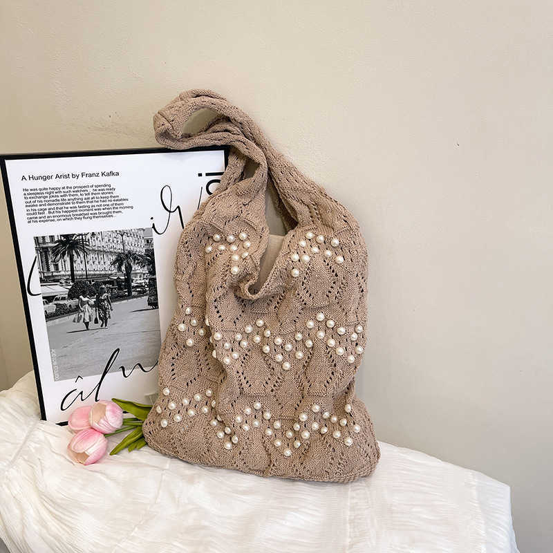 Summer woven bag for women 2025 large capacity new beach vacation beach single shoulder handbag small fresh water bucket bag