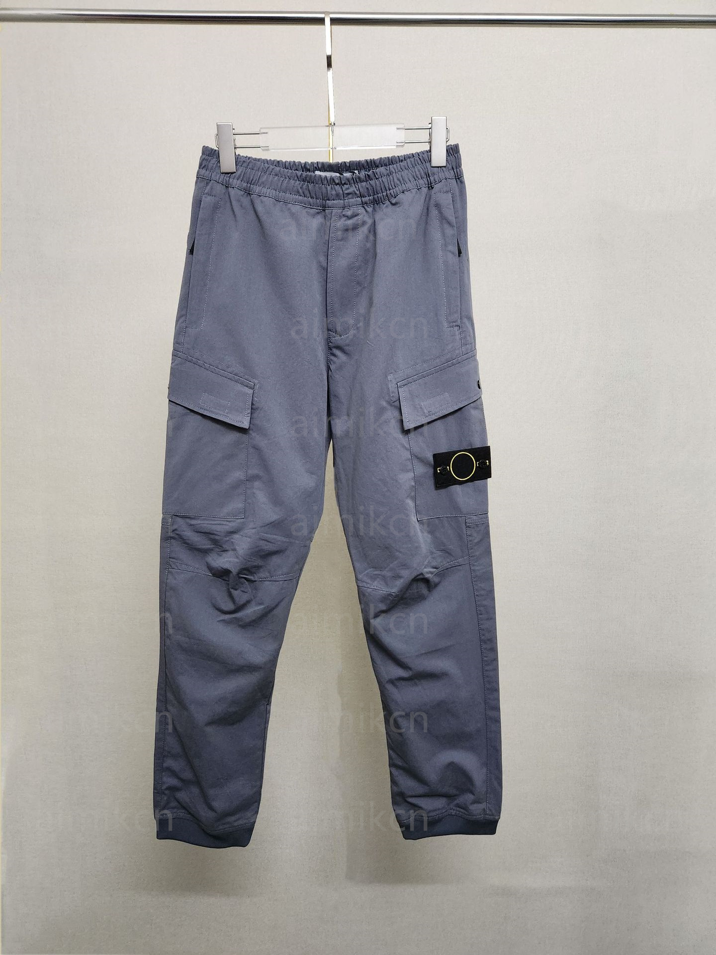 Designer men trousers fashionable multi-pocket work pants men casual waterproof elastic band pants designer outdoor sport loose pants size m-2xl