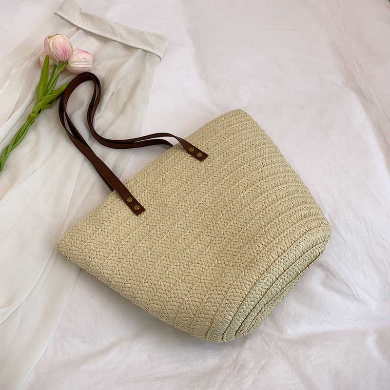 Grass woven large capacity trendy bag 2025 new tote commuting seaside vacation beach bag artistic vegetable basket bag