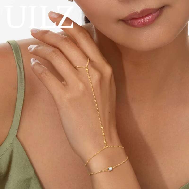 DHCollections Fashion Pearl Zircon Chain Bracelet with Finger Ring Adjustable 17.5cm Slave Hand Jewellery for Women