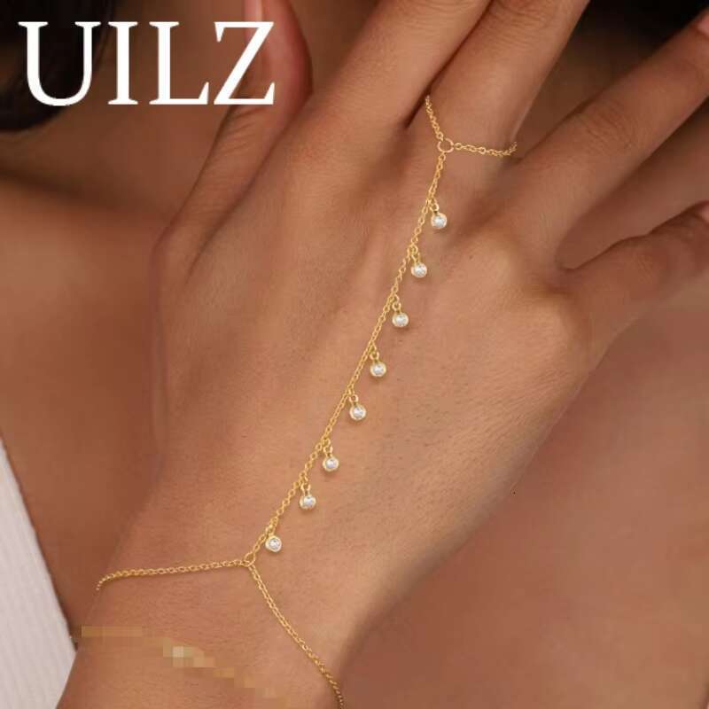 DHCollections Fashion Pearl Zircon Chain Bracelet with Finger Ring Adjustable 17.5cm Slave Hand Jewellery for Women