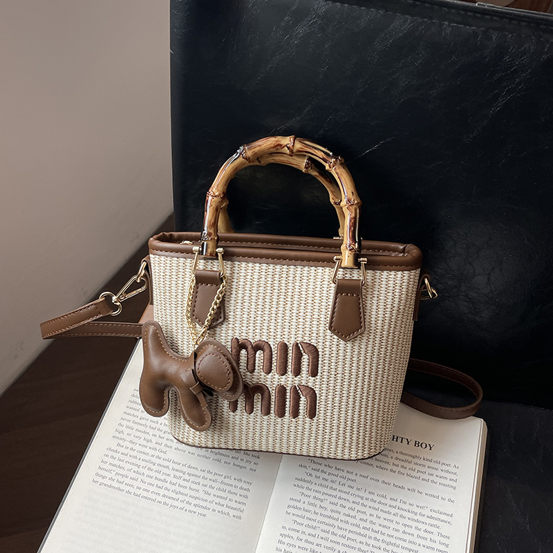 Womens bag 2025 new fashion trend bucket bag grass woven bamboo knot tote bag beach shoulder bag