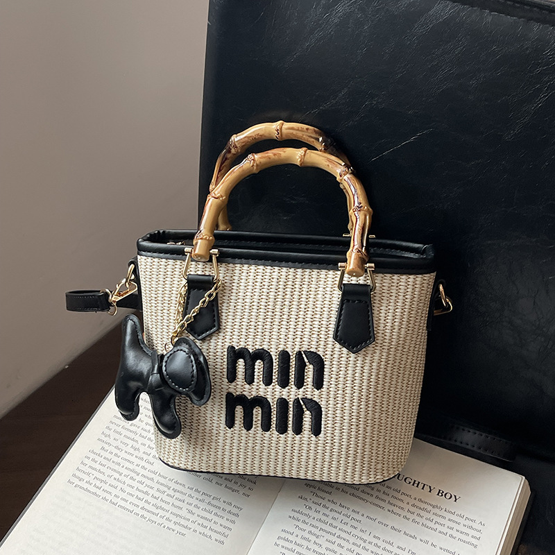 Womens bag 2025 new fashion trend bucket bag grass woven bamboo knot tote bag beach shoulder bag