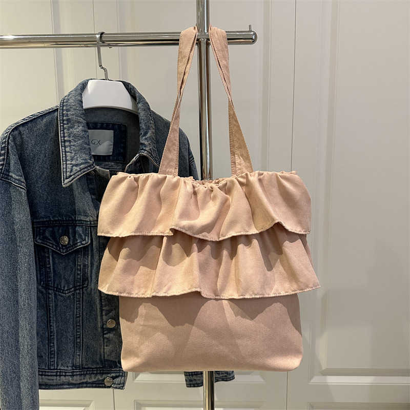 Fashionable and trendy pleated ruffled edge commuting minimalist tote bag with niche design, underarm bag with stylish and large capacity, single shou