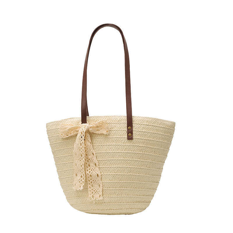Grass woven large capacity trendy bag 2025 new tote commuting seaside vacation beach bag artistic vegetable basket bag