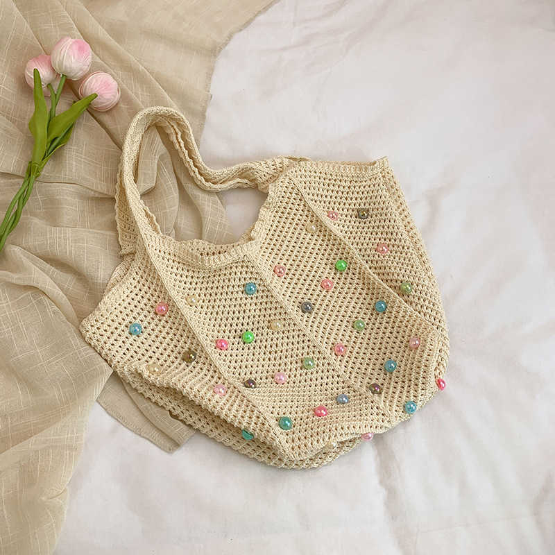 Knitted hollow out colorful fashionable colored beans fresh casual single shoulder bag women's bag 2025 new fashion trend armpit