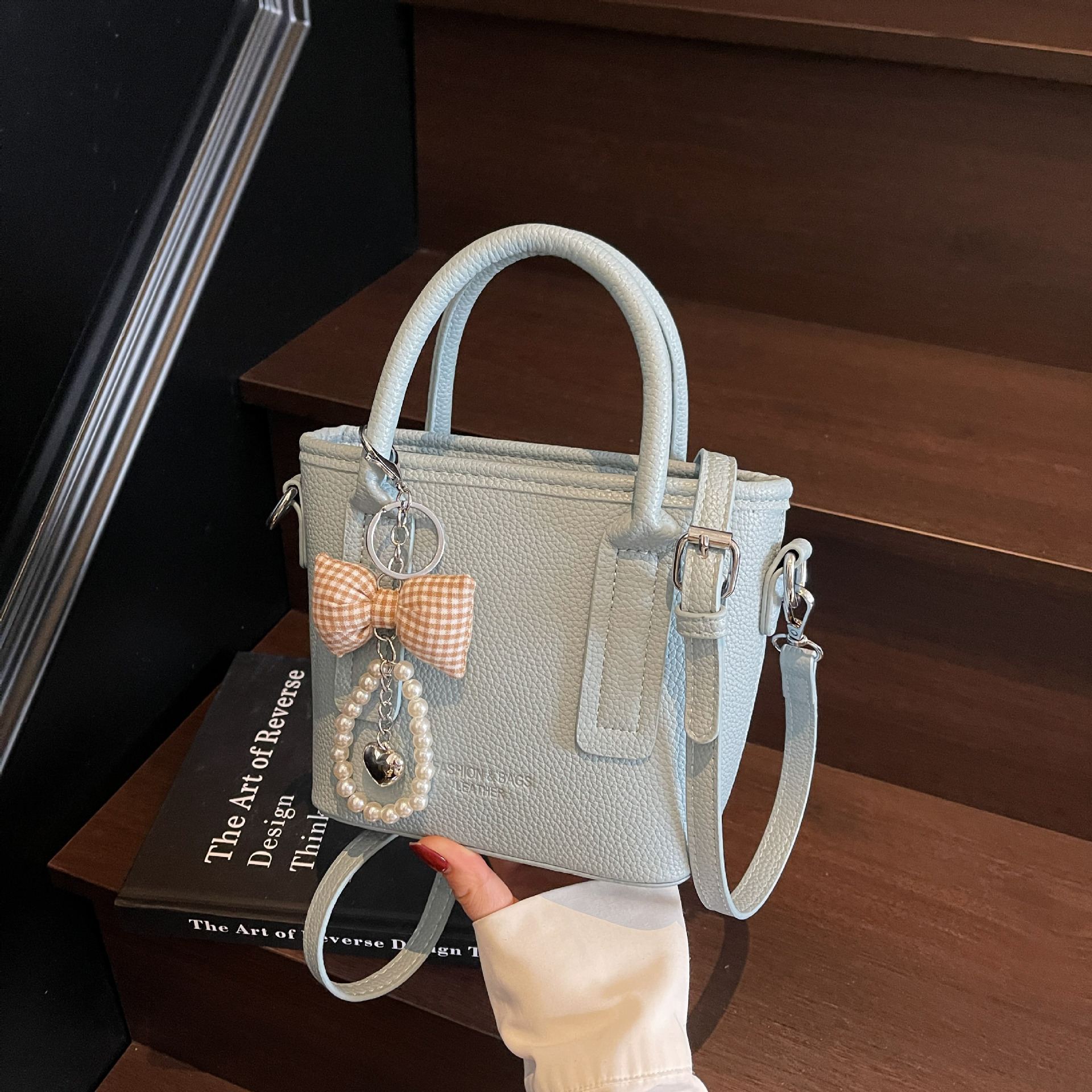 New designer bag, fashionable high beauty style small handbag, new multifunctional lychee pattern single shoulder bucket bag, niche light luxury cross