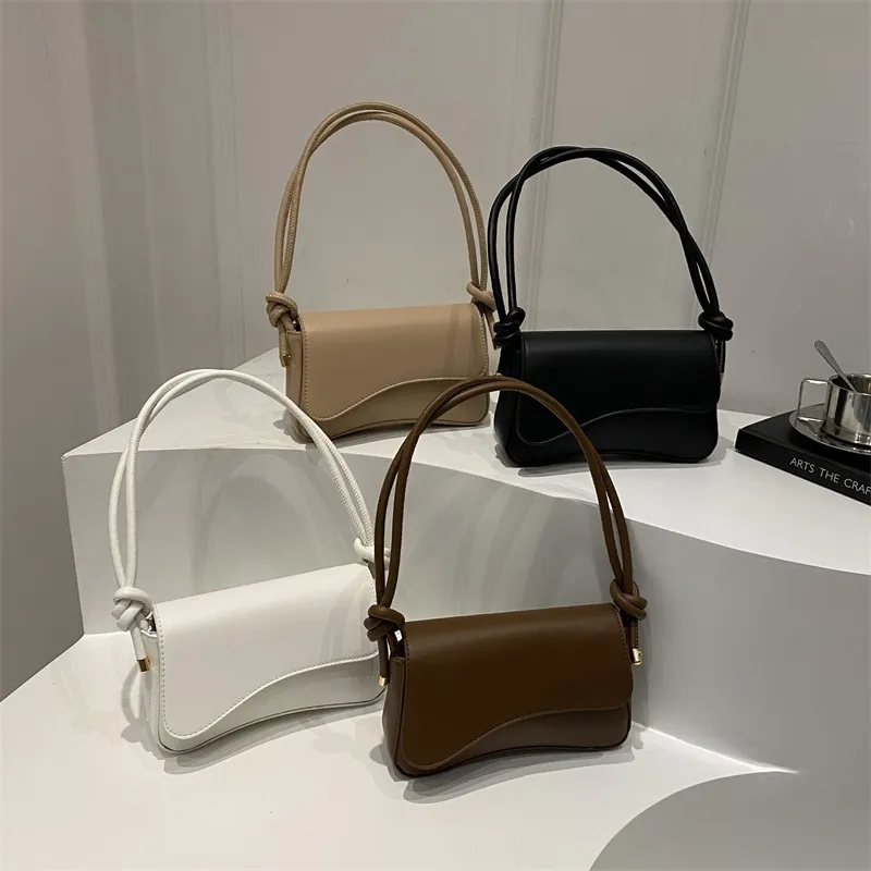 2025 designer bags simple and versatile bag solid color black for ladies is daily versatility