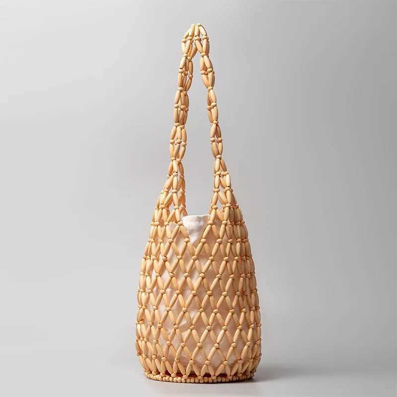 Wooden Bead Woven Bag New Design Womens Hollow Beaded Seaside Travel Versatile Hand-held Shoulder Underarm Bucket Bag Z250512