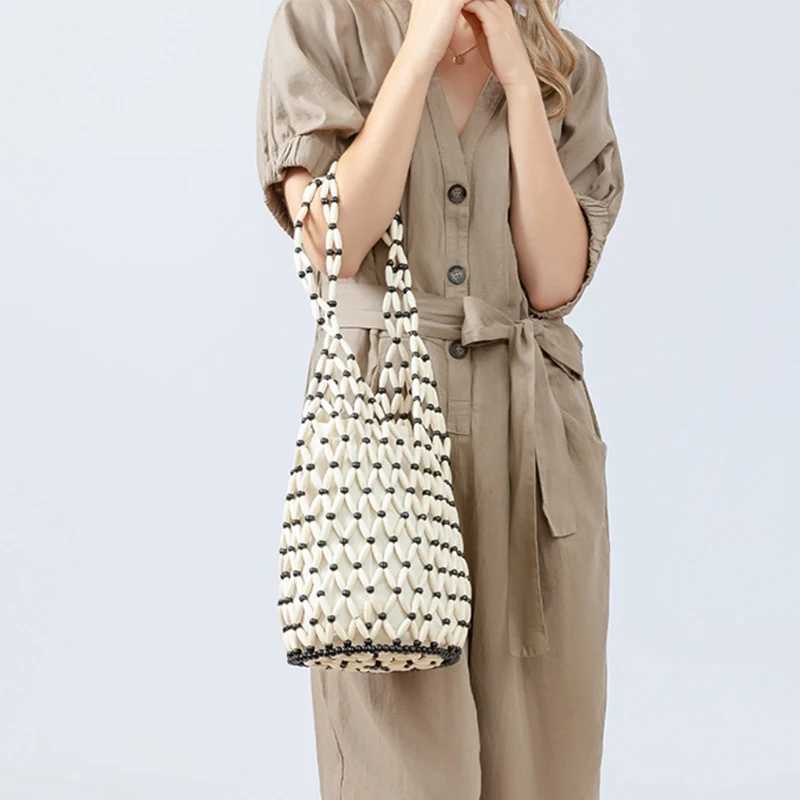 Wooden Bead Woven Bag New Design Womens Hollow Beaded Seaside Travel Versatile Hand-held Shoulder Underarm Bucket Bag Z250512