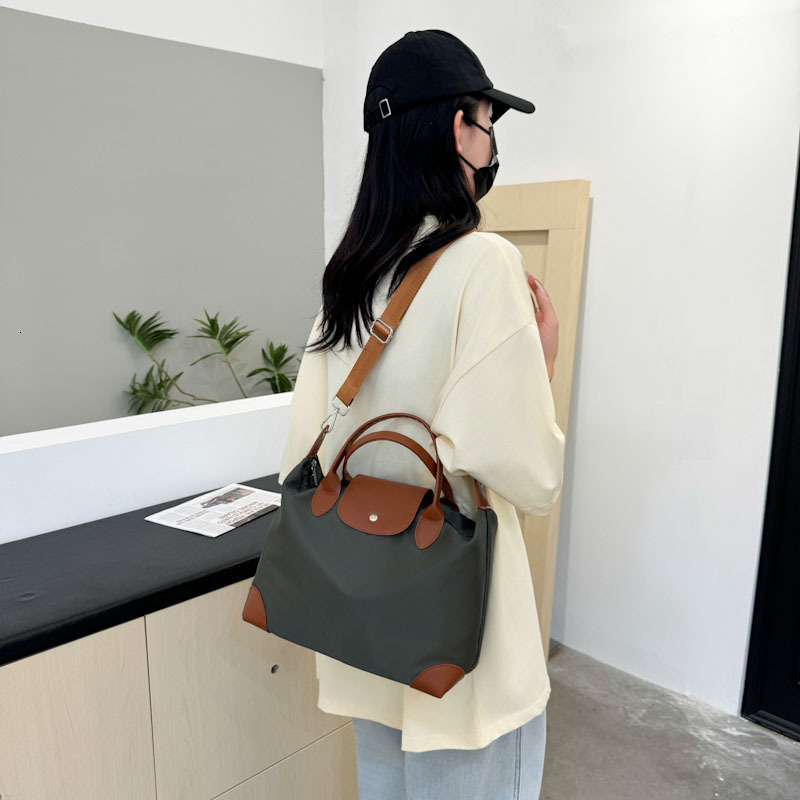 Top Quality Brand High Quality New Style Free Delivery Designer Bag British Short Distance Travel Boarding One Shoulder Diagonal Cross Bag, Nylon Larg