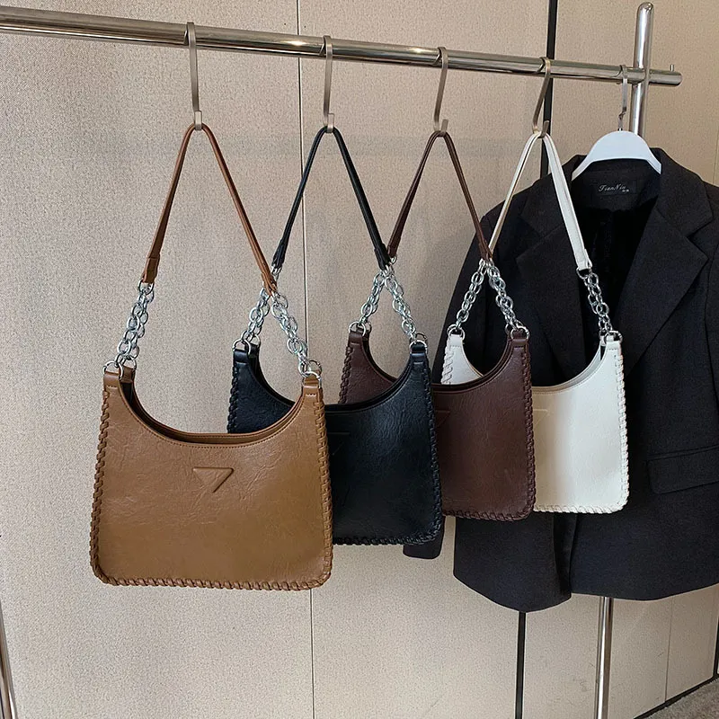 2025 New designer shoulder bags for womans printing latch handbag fashionable flap women messenger chain armpit bag
