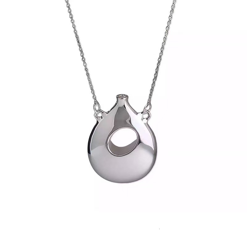 2025 Sculpture Hollow Solid Irregular perfume Bottle Pendant Small Design High Fashion Minimal Necklace Female
