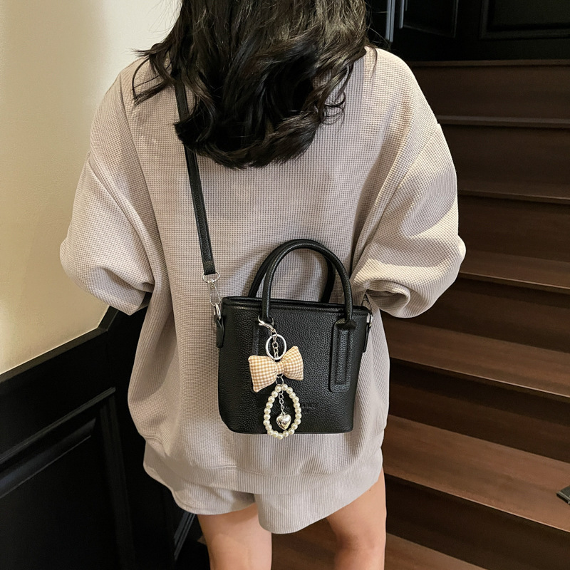 New designer bag, fashionable high beauty style small handbag, new multifunctional lychee pattern single shoulder bucket bag, niche light luxury cross