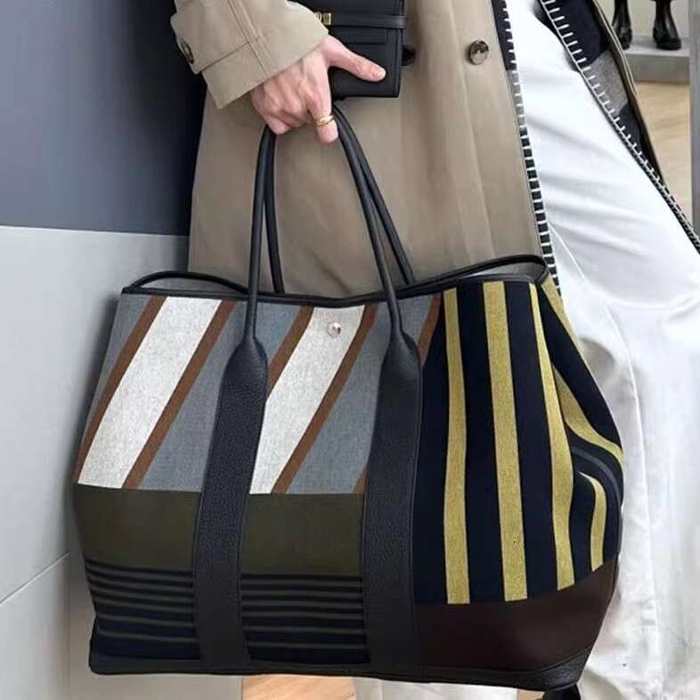 Internet celebrity s same striped contrasting large capacity commuting tote bag niche high end women