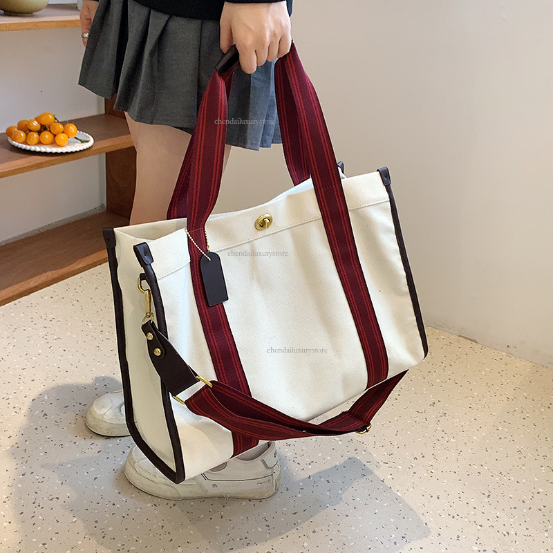 2025 New Women's Shoulder Bag Designer Slant Canvas Fashion Handbag Large Capacity Contrastive Color Niche Trend Crossbody Bag Casual Shopping Ba