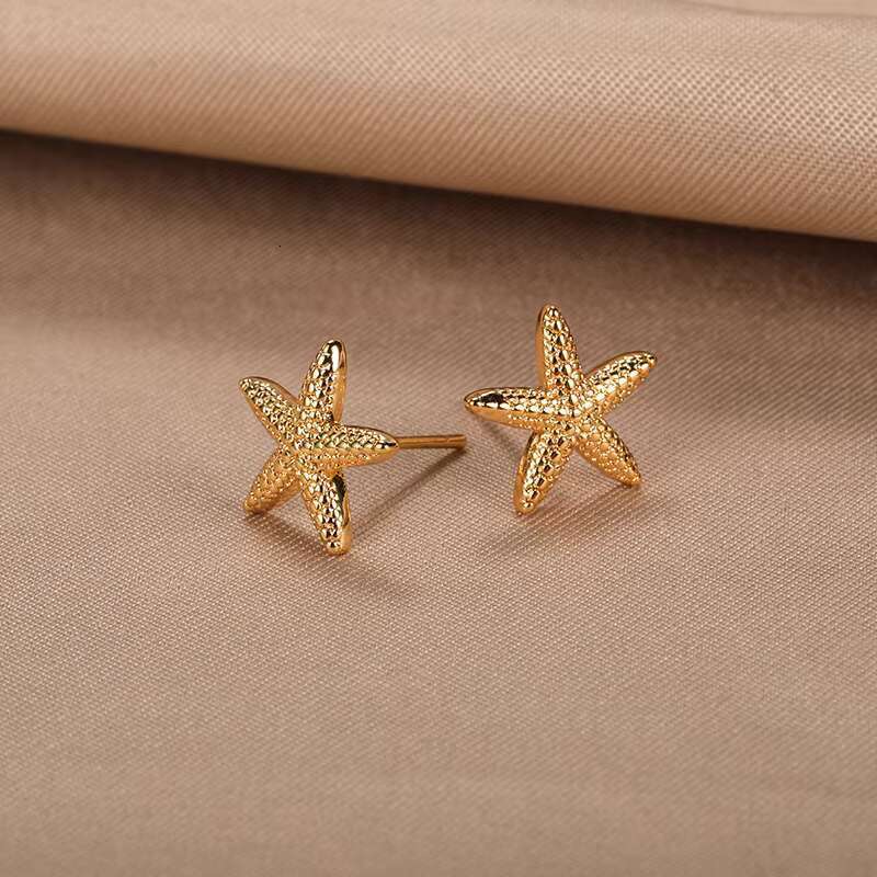 new women's stainless steel gold starfish earrings 2025 popular perforated jewelry birthday gift
