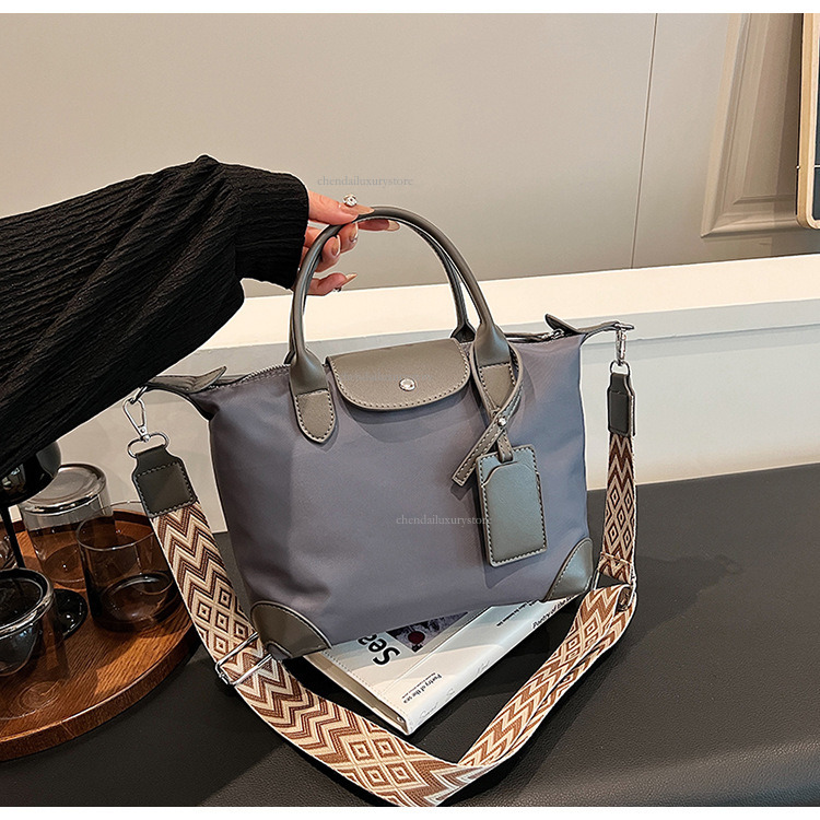2025 Women's Nylon Waterproof Handbag Designer Fashion And Leisure Multi Functional Shoulder Crossbody Bag Splicing Simple Zipper Travel Storage 