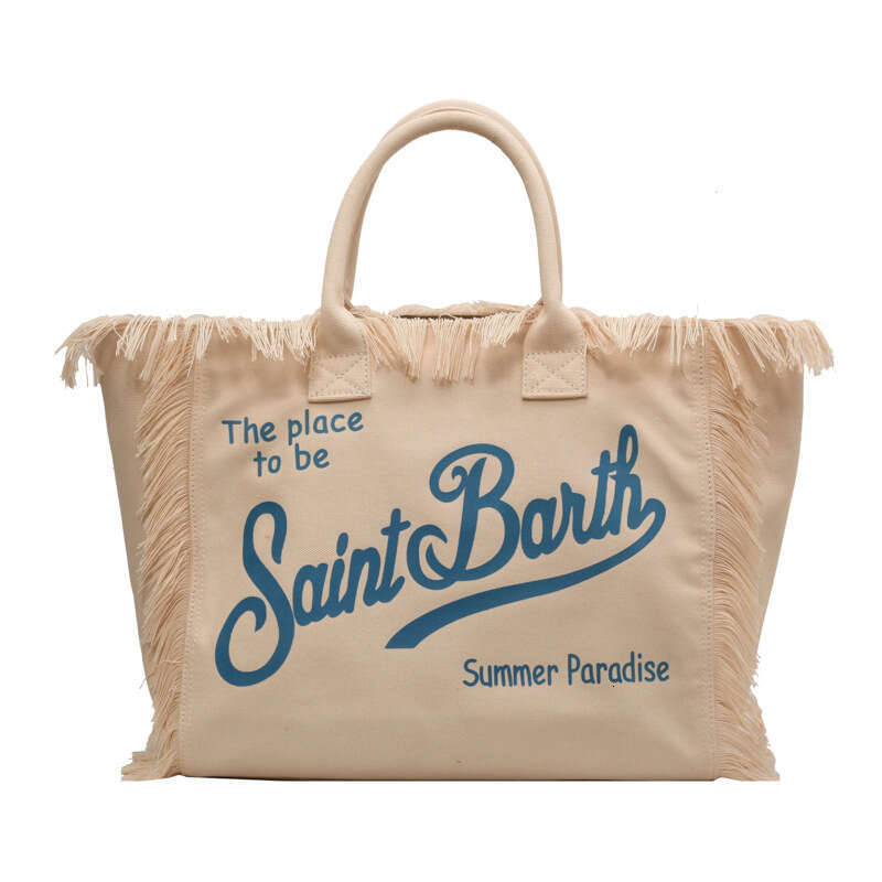 Design sense women's European American beach large capacity single shoulder commuting handmade tassel printed tote bag, new style, chic and elega
