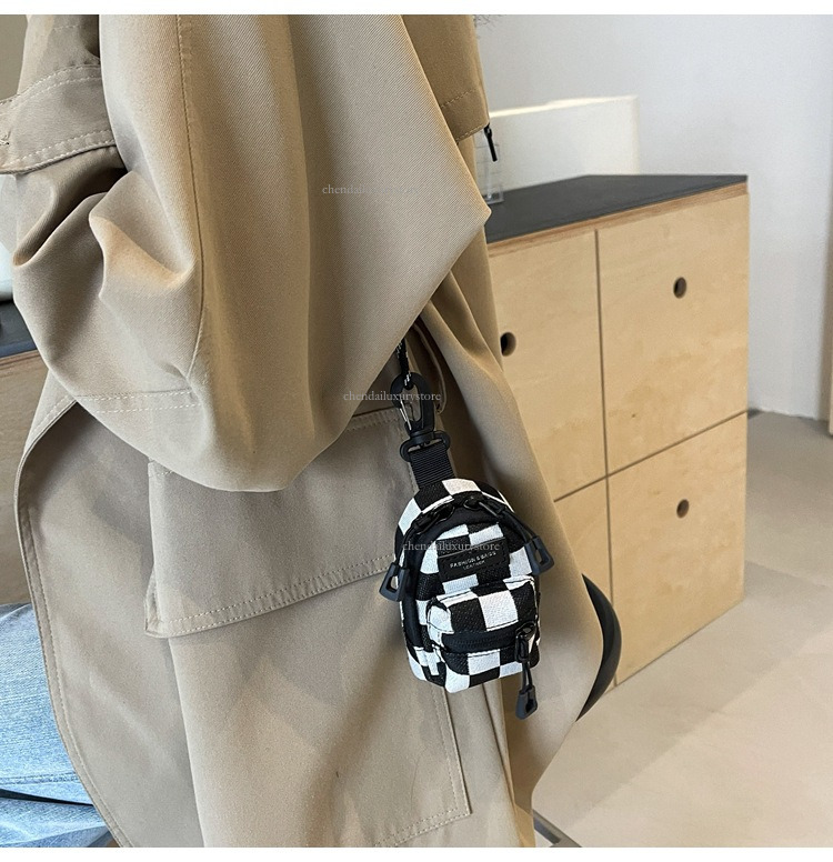 2025 Designer Bag New Fashionable Lipstick Headphone Storage Mini Bag Pendant Bag Niche Design Spotted Ripple Single Shoulder Crossbody Bag Unisex