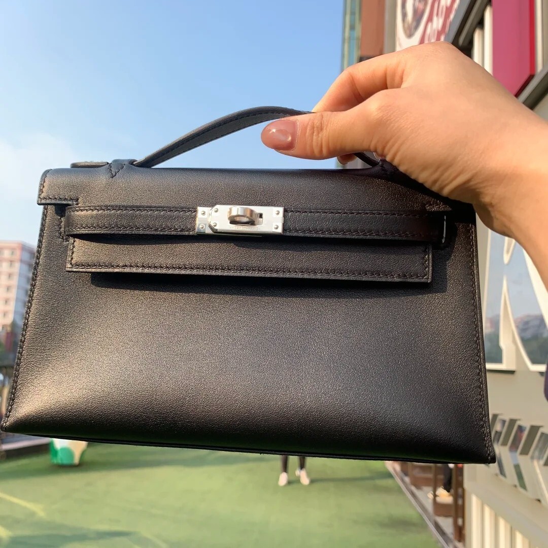 The same high quality as that of luxury stars Family's first generation Kelly 22 palm patterned cowide ig-end andbag single soulder crossbody bag silver buckle