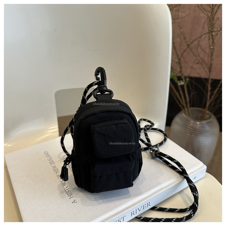 Designer pendant mini small square bag nylon waterproof women's multi pocket headphone bag minimalist solid color zipper crossbody bag coin pocke