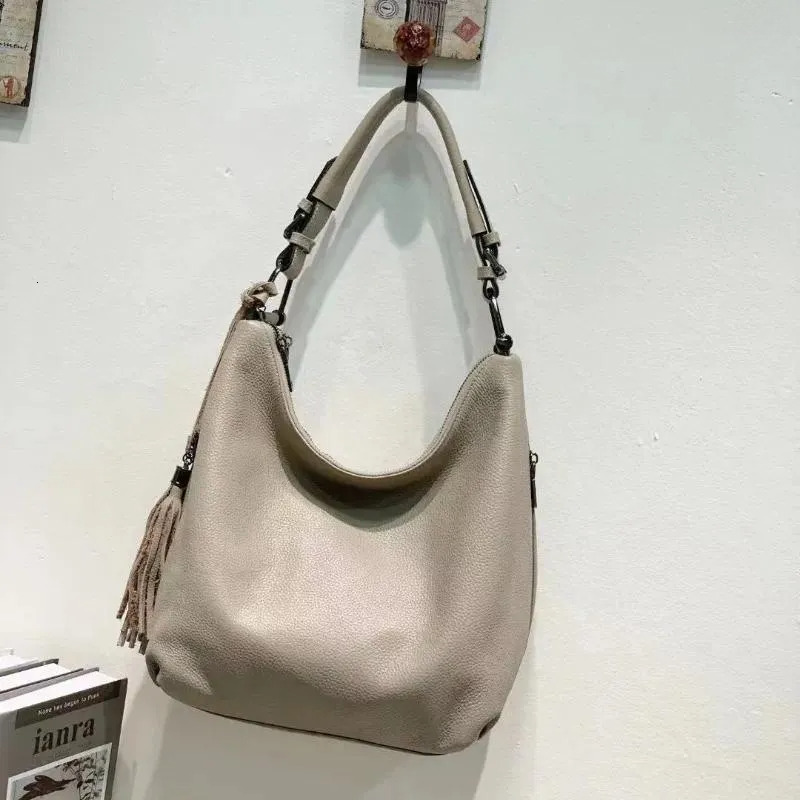 European Style Genuine Leather Women's Tote: Underarm Shoulder Cowhide Tassel Handbag New Free Delivery Designer Bag
