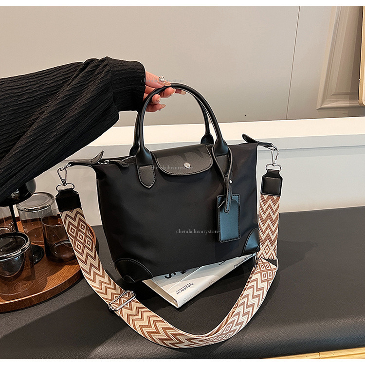 2025 Women's Nylon Waterproof Handbag Designer Fashion And Leisure Multi Functional Shoulder Crossbody Bag Splicing Simple Zipper Travel Storage 