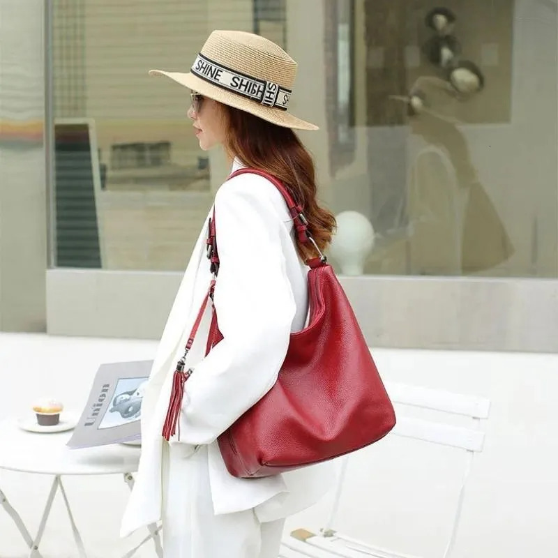 European Style Genuine Leather Women's Tote: Underarm Shoulder Cowhide Tassel Handbag New Free Delivery Designer Bag