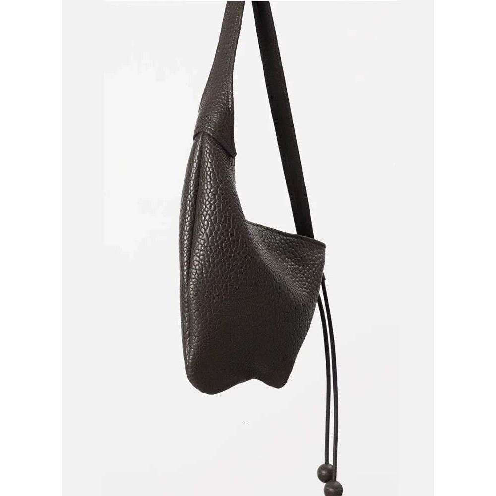 Soft leather lychee pattern niche lazy style large capacity versatile crossbody armpit casual bag