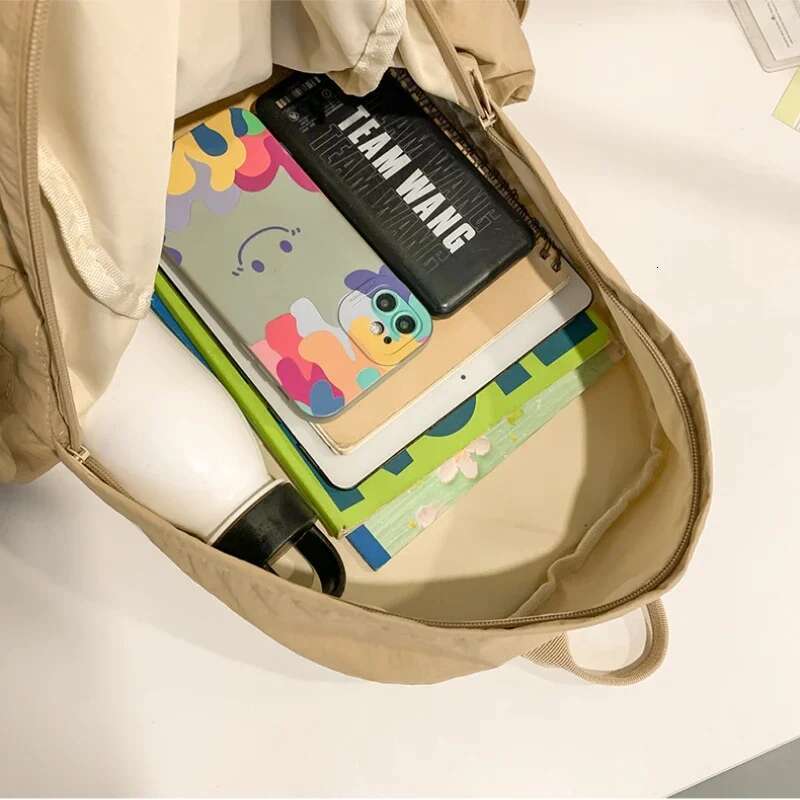 New Student Women's Japanese Style Lightweight and Fashionable Solid Color Simple Bow Casual Travel Backpack