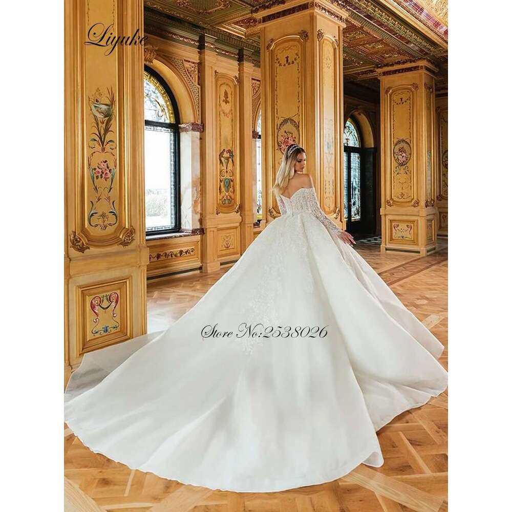 Liyuke Beauty Beading Pearls Ball Gown Princess Wedding dress Off Shoulder Full Sleeves Sparking Lace Court Train Bridal Gowns